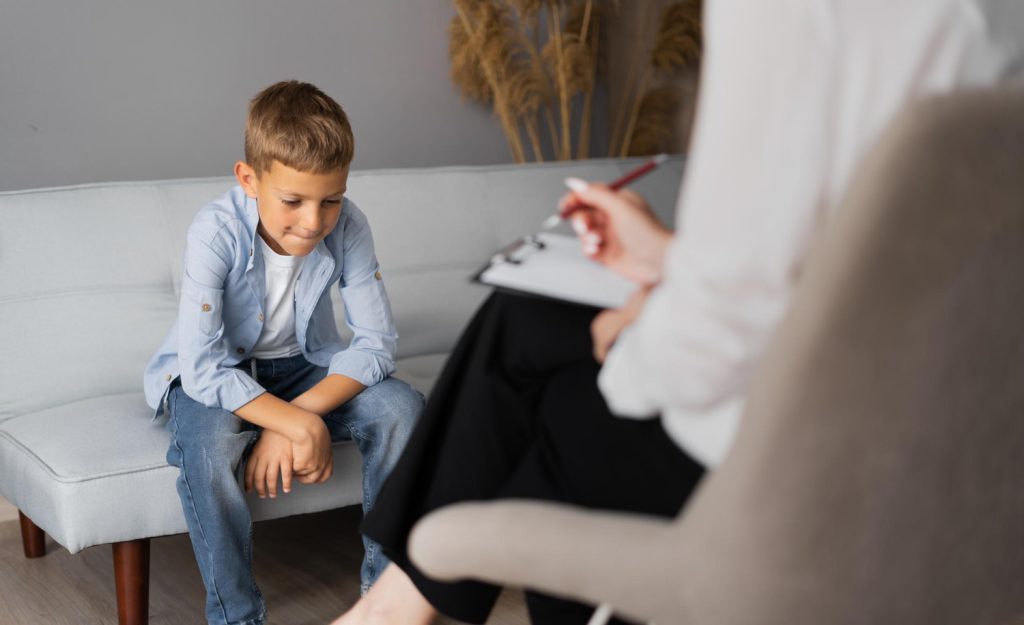 Child working through an organisation and planning exercise in an ADHD therapy session
